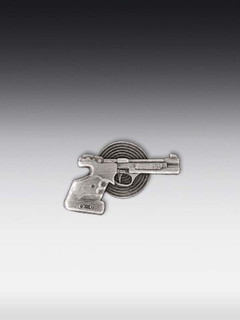 Tinnen relief Pistol